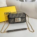 Small sized magic stickMini baguetteBrown fabric handbag