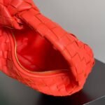 Bottega Veneta, a woven round wandering bag - Image 9