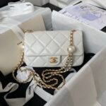 Chanel Pearl mini clutch bag
