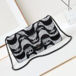 CHANEL  limited edition sequin black and white wave bag