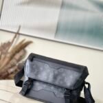 black flower Voyager small messenger bag