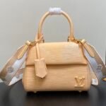 Louis Vuitton Apricot Lacquer Water Ripple Handbag