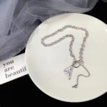 Prada's new necklace - Image 6