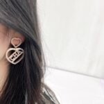 Chanel double heart-shaped hollow letter earrings - Image 8