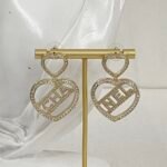 Chanel double heart-shaped hollow letter earrings - Image 6