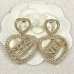 Chanel double heart-shaped hollow letter earrings - Image 4