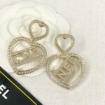 Chanel double heart-shaped hollow letter earrings