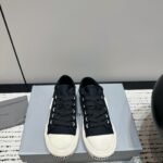Balenciaga's new vintage graffiti print ripped canvas pair shoes